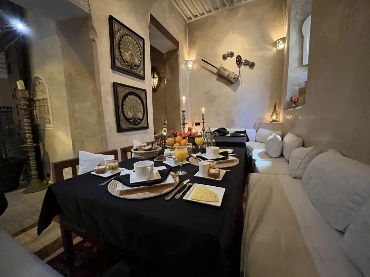 Table laid in the riad’s lounge by candlelight